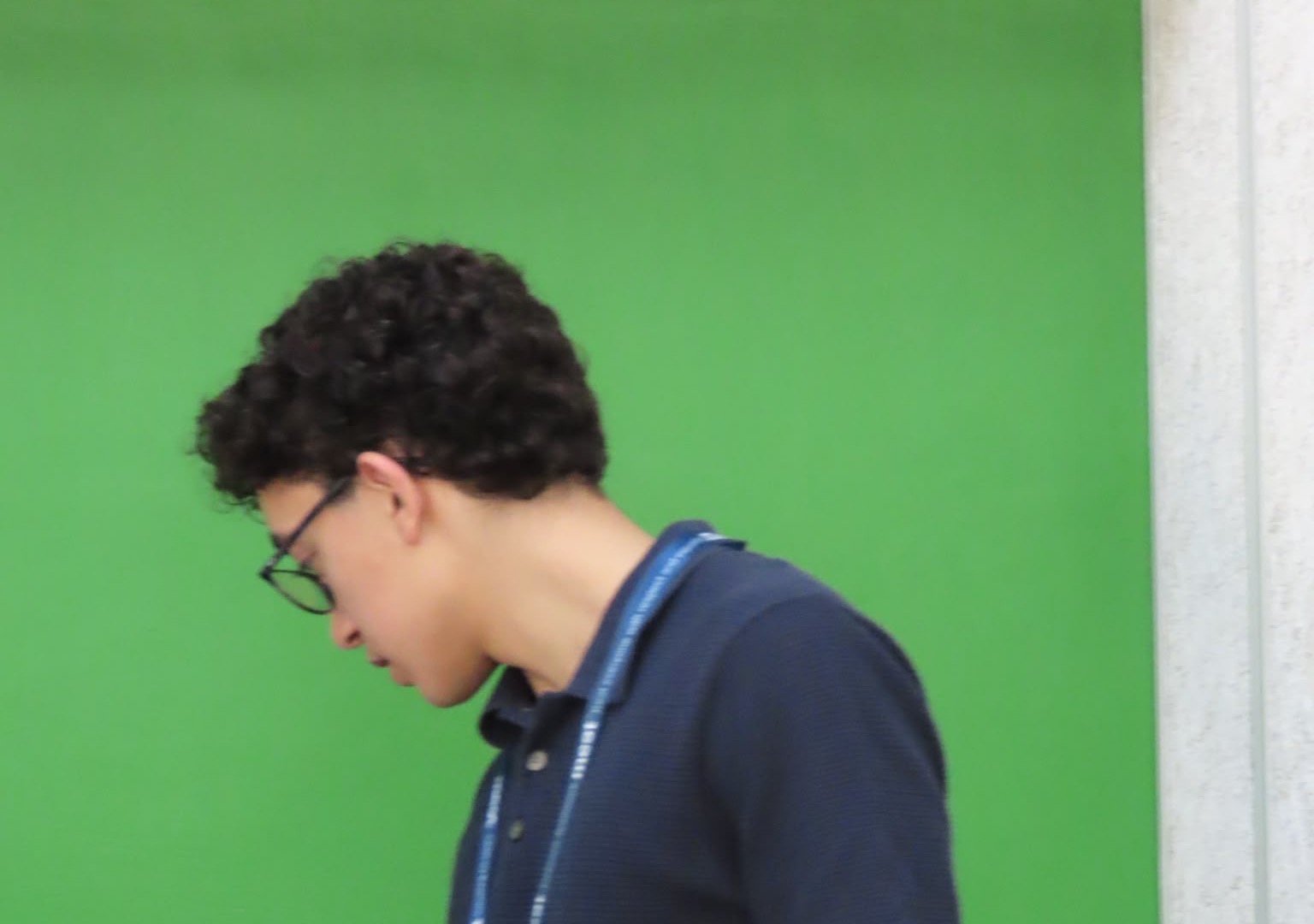 Yazan assisting students during a MEET computer science lab
